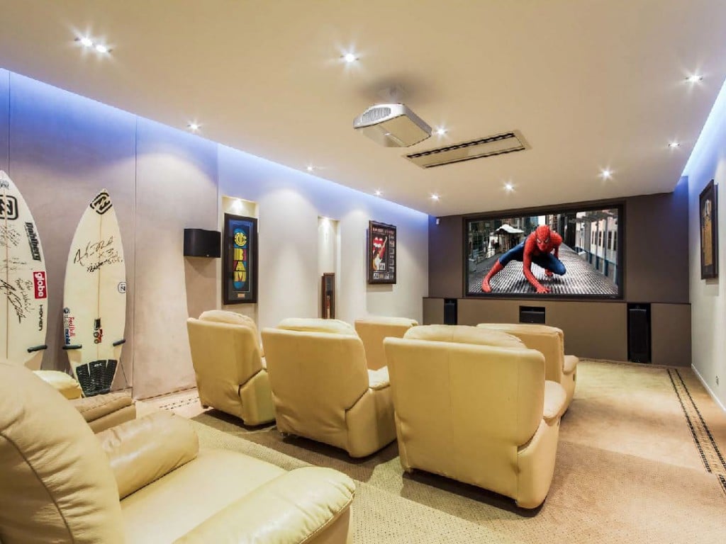 Multi-level media room with large flatscreen tv and intelligent lighting system